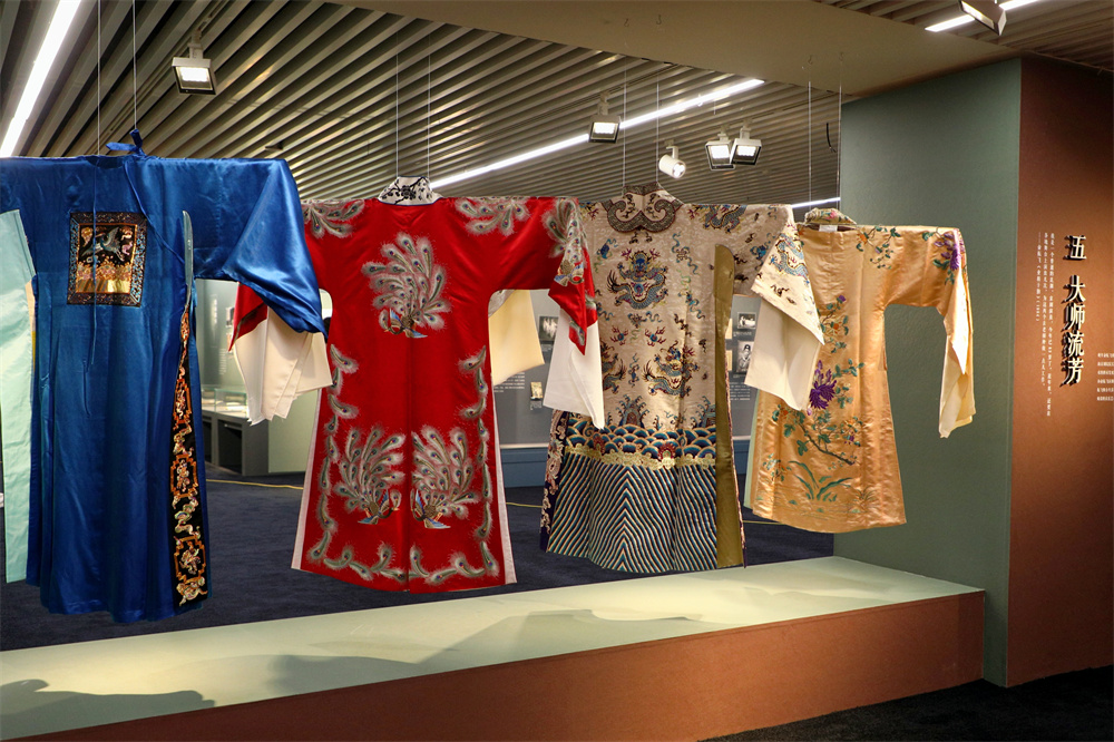 Four Kunqu Opera Xiaosheng costumes on display