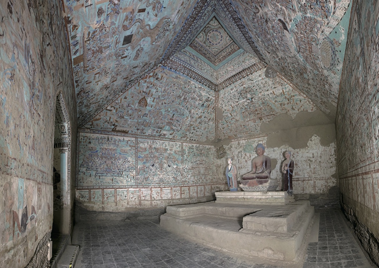 Figure 13: The interior of Cave 85 of Mogao Grottoes, you can see the "Devil in Disguise" late 9th century on the west wall behind the Buddha statue