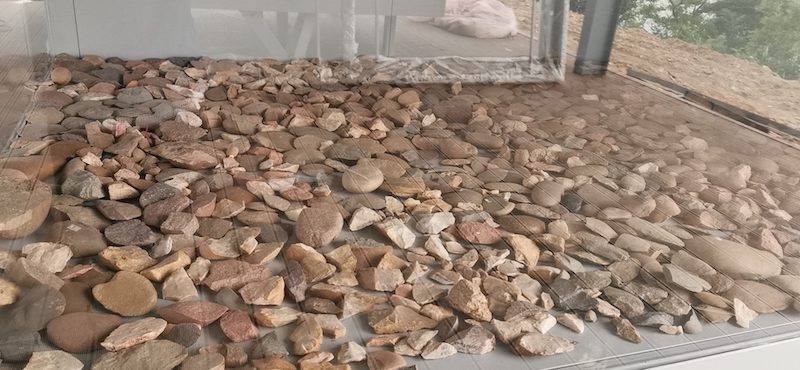 Outdoor display of stone tools from the Guanzhou site dating from 7500 to 8000 years ago