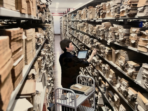 Ancient books waiting to be restored in the library