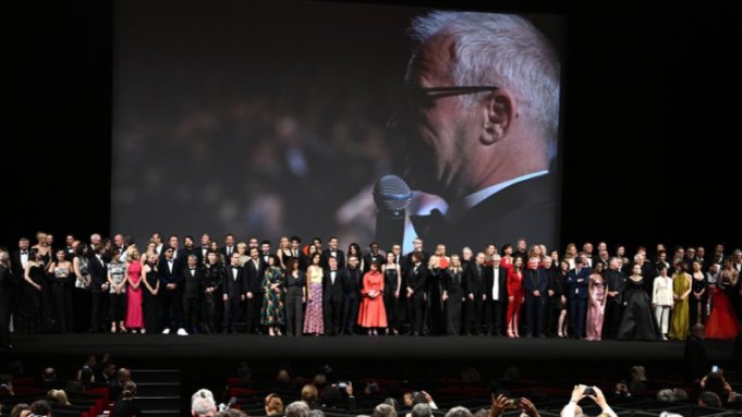 Filmmaker leaves family portrait at Cannes 75th anniversary event